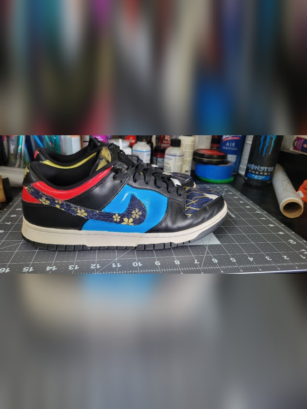 Nike Men’s Black & Blue Low-Top Sneaker with Floral Swoosh